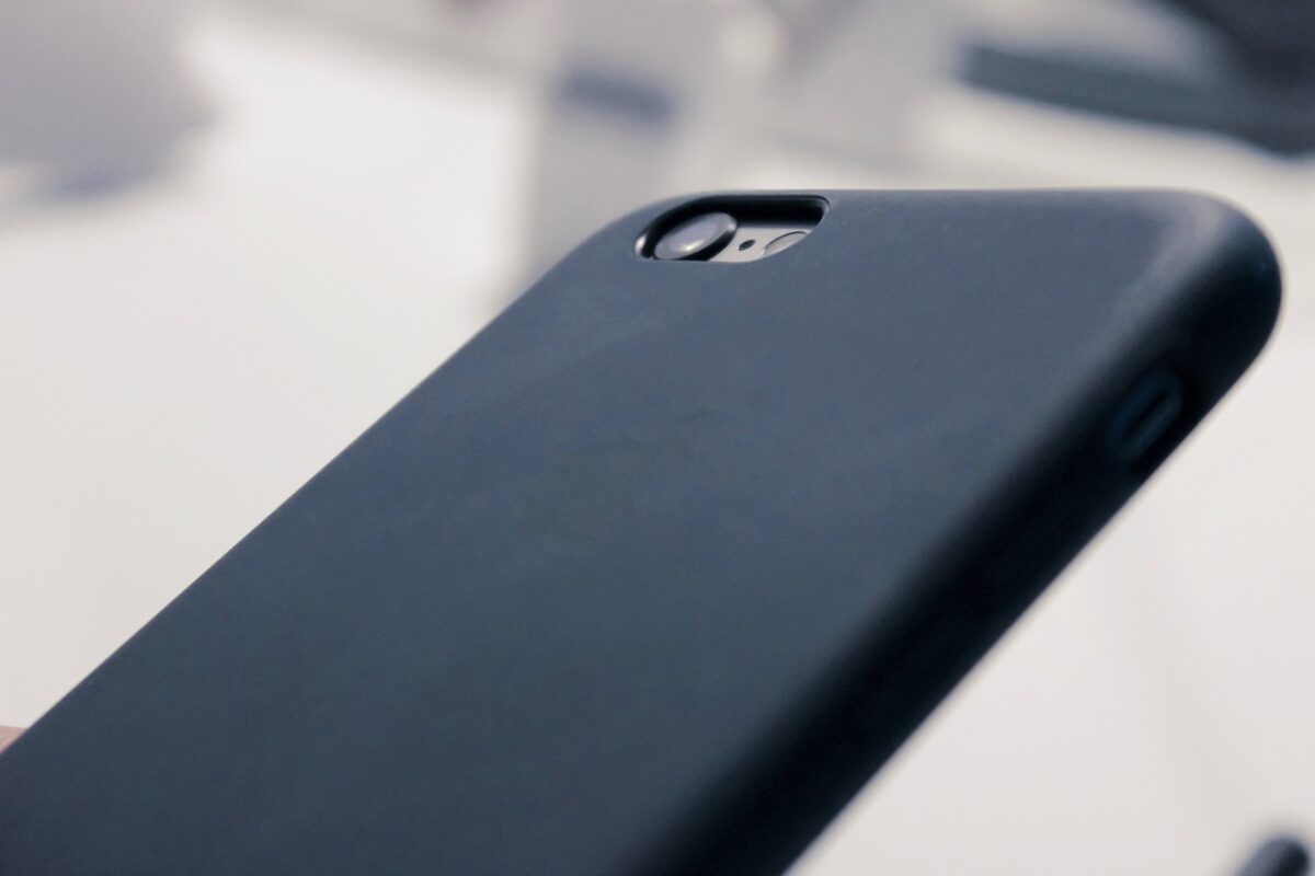 Will an adhesive grip stick to my case?